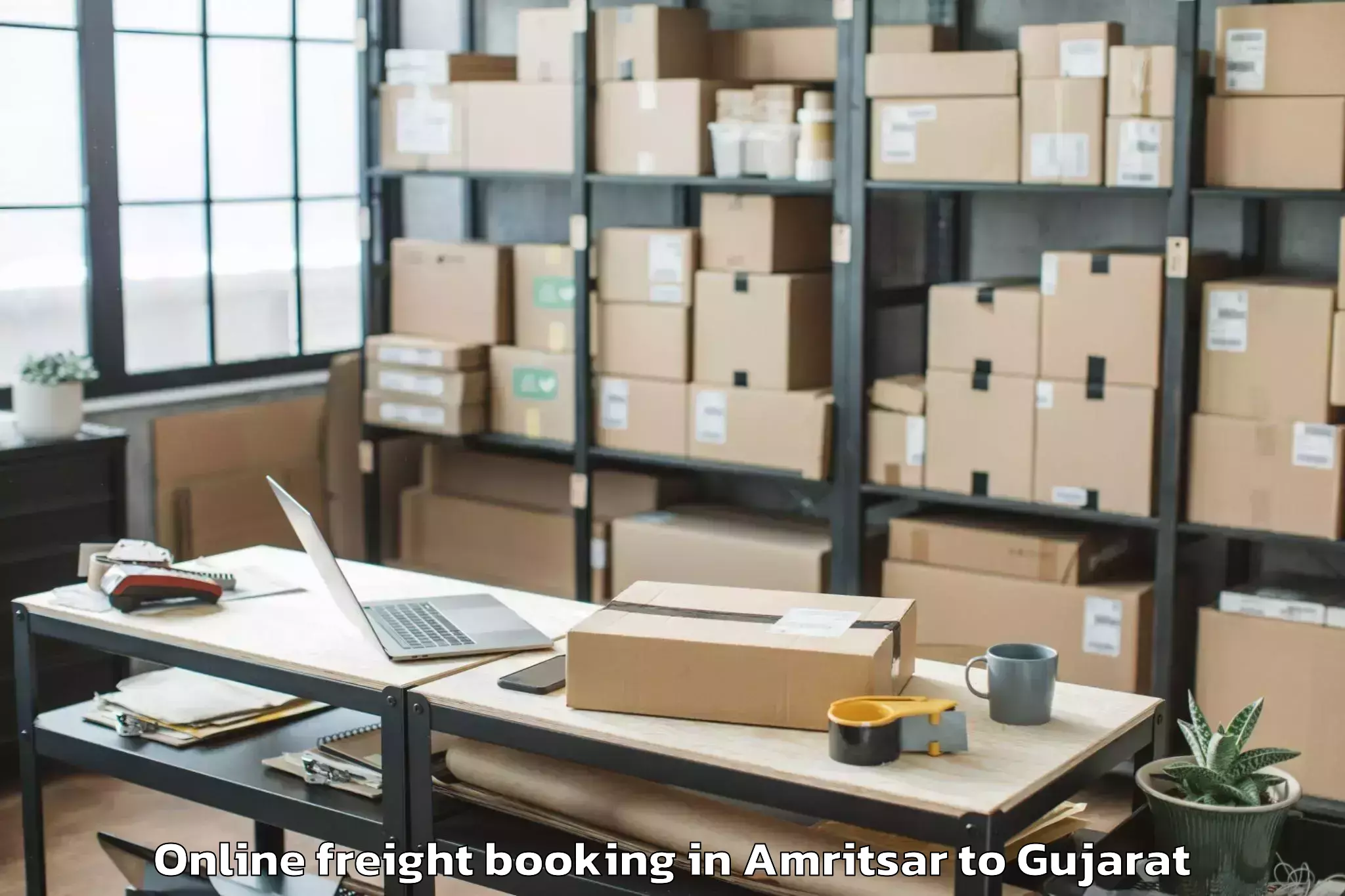 Leading Amritsar to Lodhika Online Freight Booking Provider